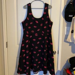 Black skater dress with white dots and lips